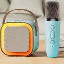 Mini caixinha de som com microfone